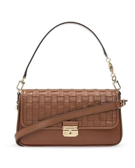 michael michael kors bradshaw small woven leather shoulder bag|michael kors black messenger bag.